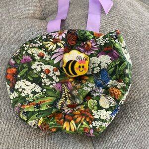 Flower garden ponytail scrub cap and bee badge reel